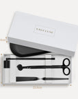 Vaucluse Fragrance branded white gift box showing the matte black candle care tool set inside with product dimensions.