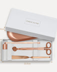 Vaucluse Fragrance luxury white gift box packaging revealing a rose gold candle trimmer tool set with labeled dimensions.
