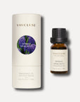 A 10ml amber bottle of Vaucluse spring hyacinth essential oil next to its matching white cylindrical tube packaging box.