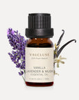 Vaucluse 10ml Vanilla Lavender and Musk essential oil amber glass bottle styled with lavender sprigs and vanilla beans.