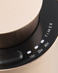 A close-up detail view of the black interface ring on the rose gold diffuser, highlighting custom timer settings for 1 hour, 2 hours, and 4 hours.