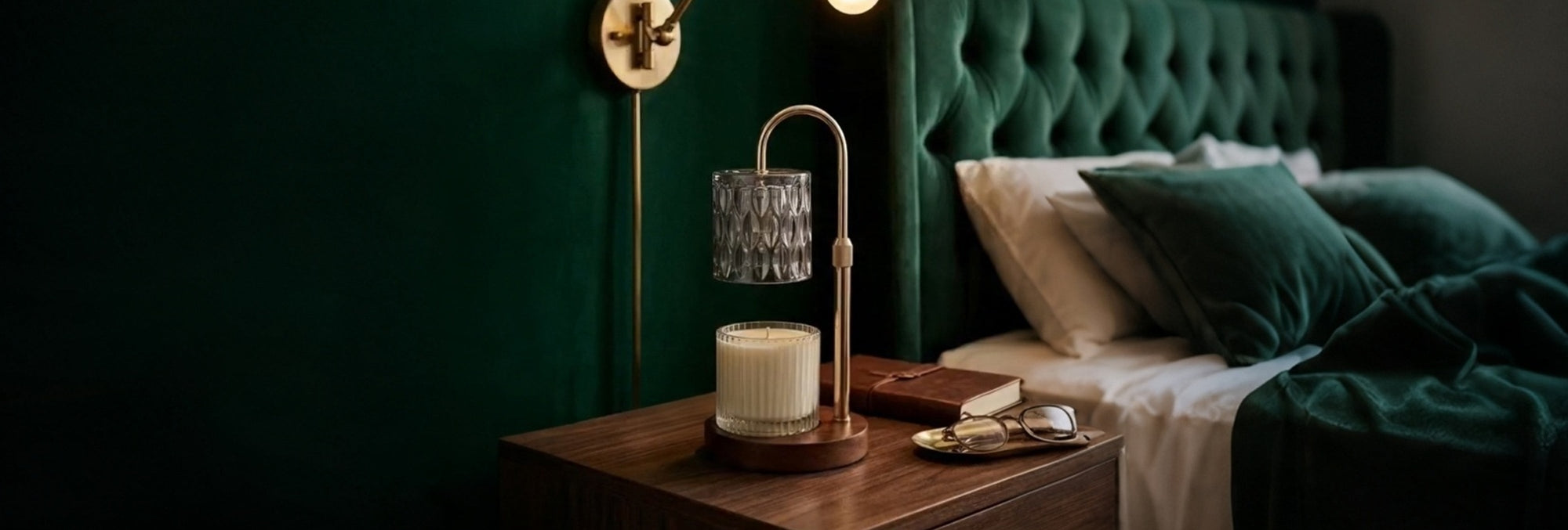 Three Vaucluse candle lamps with gold stands, wood bases, and textured glass shades warming scented candles