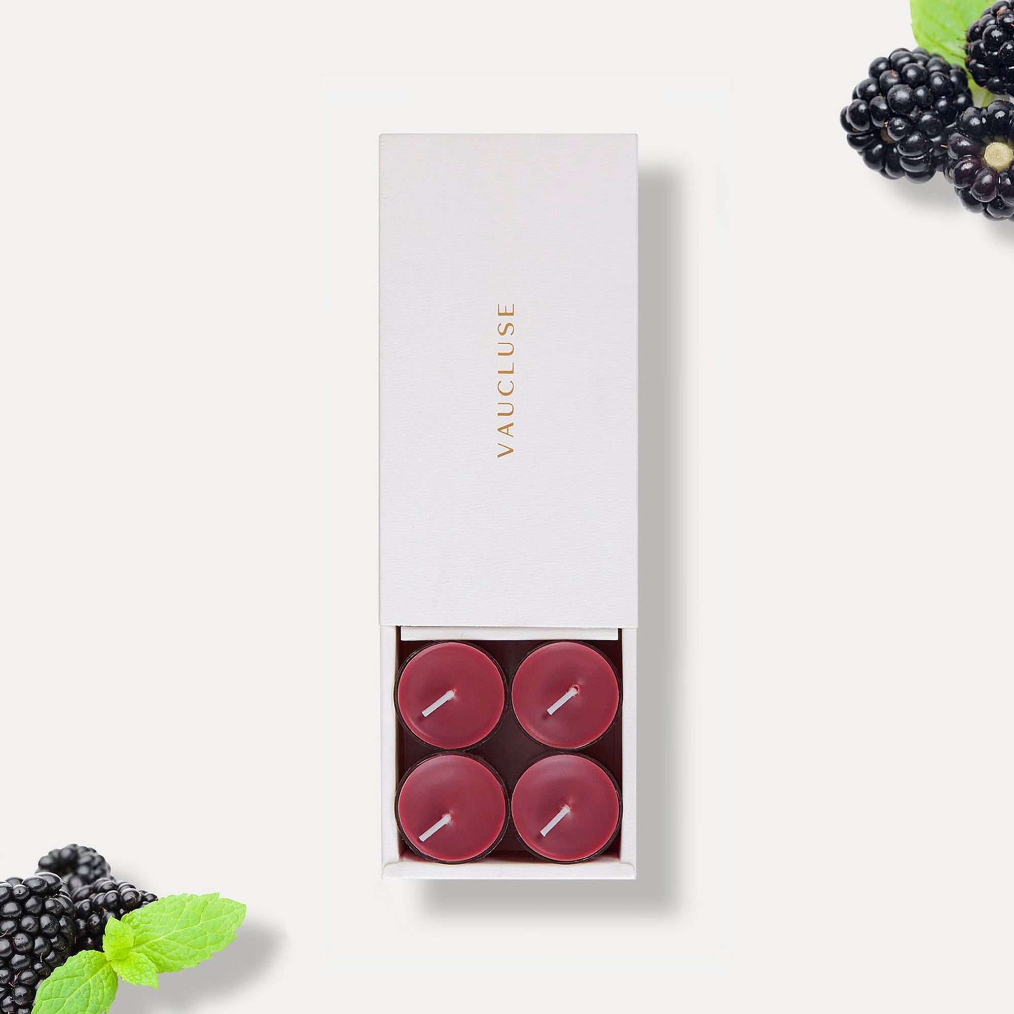 Vaucluse Blackberry scented tealight candles in a premium white slide-out gift box.