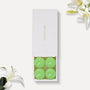 Vaucluse Lily scented tealight candles in minimalist luxury packaging.