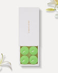 Vaucluse Lily scented tealight candles in minimalist luxury packaging.