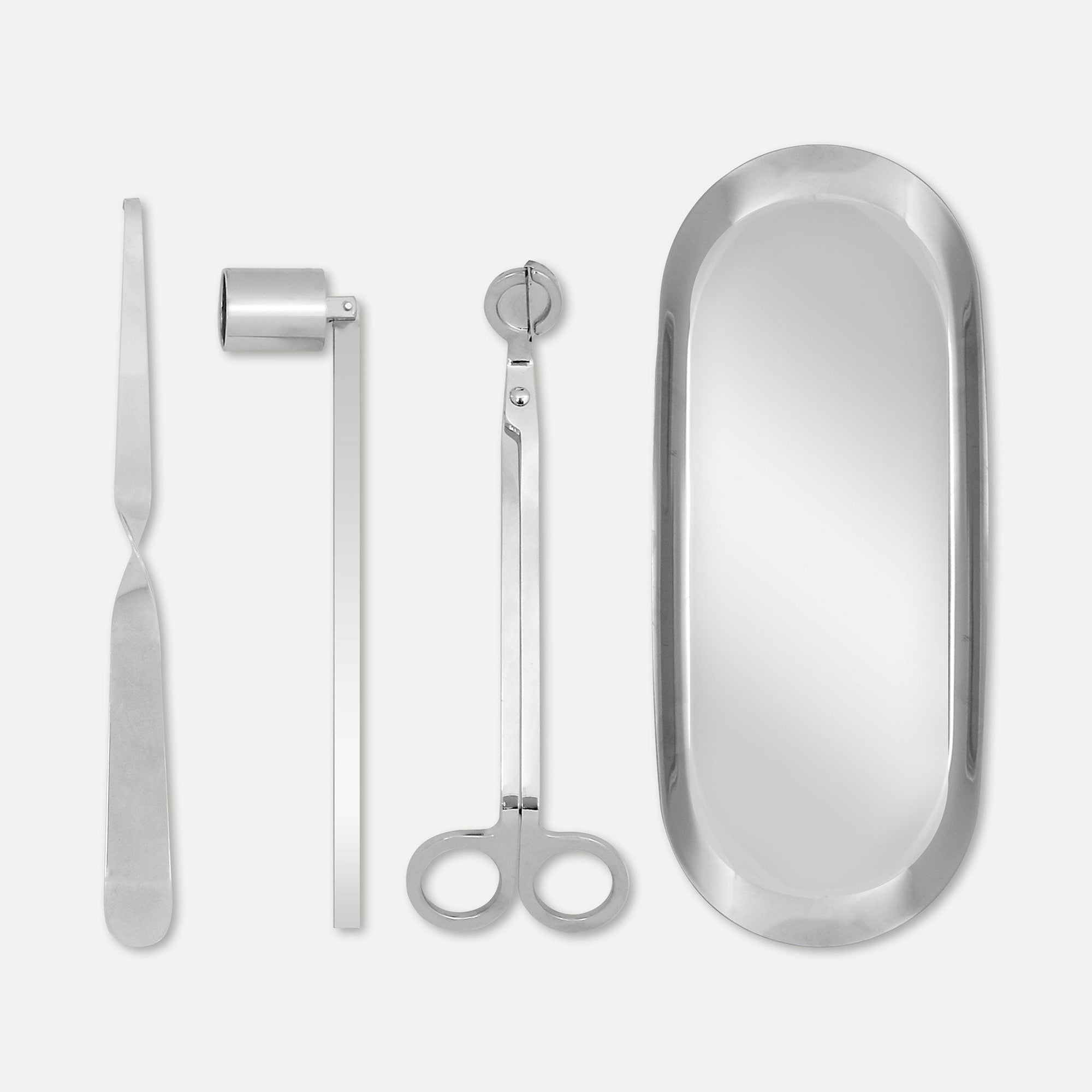 Premium silver candle care accessory set featuring a stainless steel wick trimmer, candle snuffer, wick dipper, and matching oval tray on a clean background.