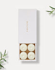 Vaucluse Vanilla scented tealight candles in a premium white slide-out gift box.
