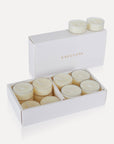 An open box of Vaucluse Jasmine scented tealight candles showing a premium white presentation pack filled with white soy tealights.