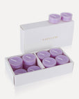 An open box of purple Vaucluse Lavender scented tealight candles showing a premium white presentation gift pack filled with soy tealights.