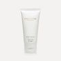 Vaucluse Fragrance Rose Velvet Hand Cream in a sleek white tube against a minimal grey studio background.