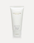 Vaucluse Fragrance Rose Velvet Hand Cream in a sleek white tube against a minimal grey studio background.