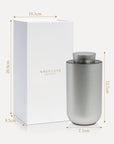 An infographic chart displaying the silver diffuser dimensions at 13.3cm height and 7.1cm width next to its elegant white presentation box.